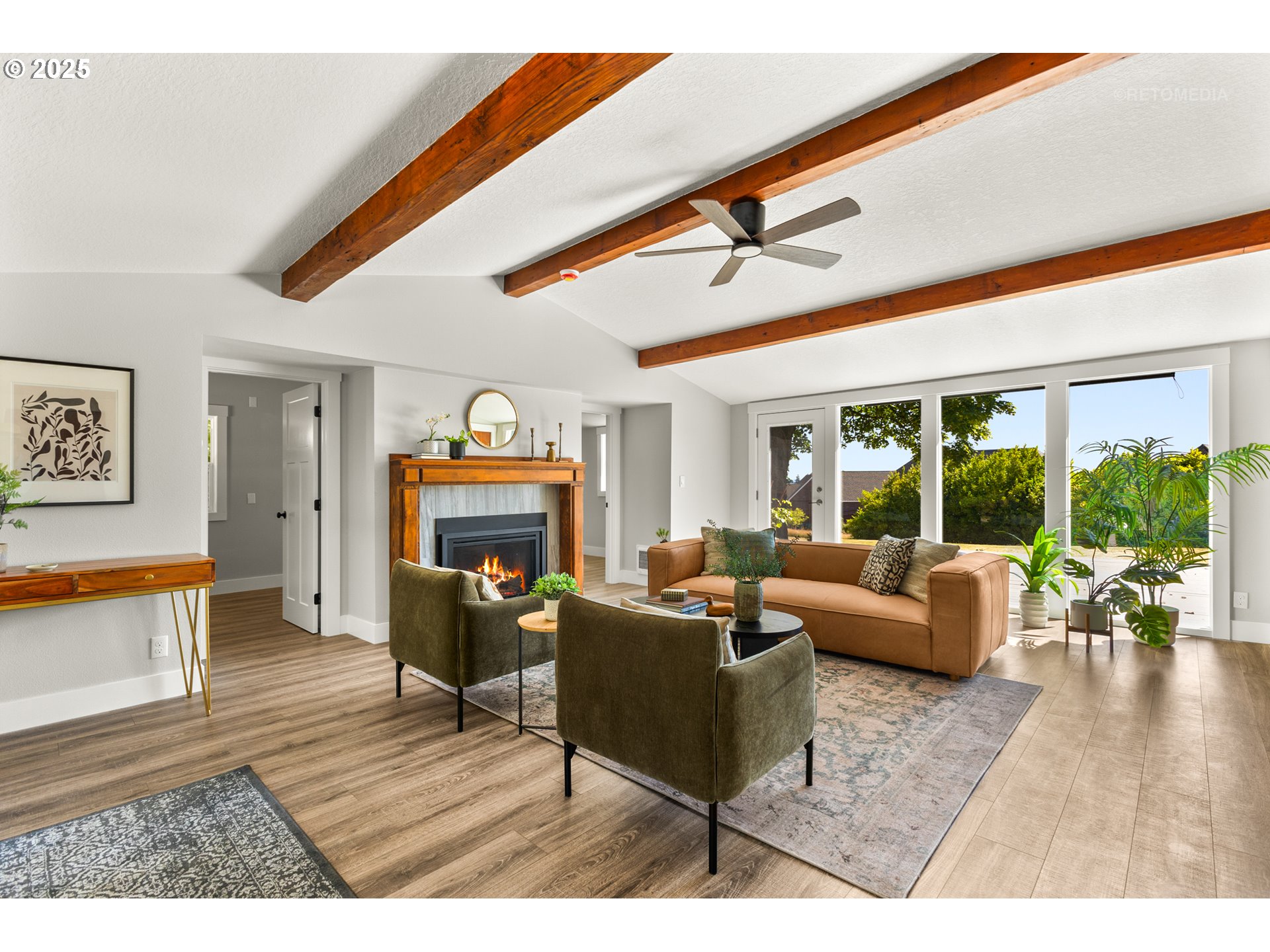 22645 Southwest Chapman Road Sherwood, OR 97140 - Photo 4 of 48 a living room with furniture and a large window