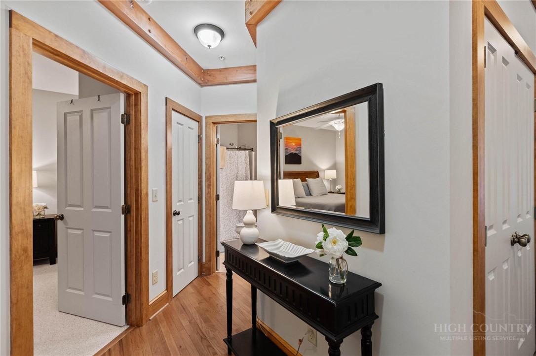 142 Evening View Lane, Unit CA3 Boone, NC 28607 - Photo 19 of 41 a view of a hallway with a mirror and furniture