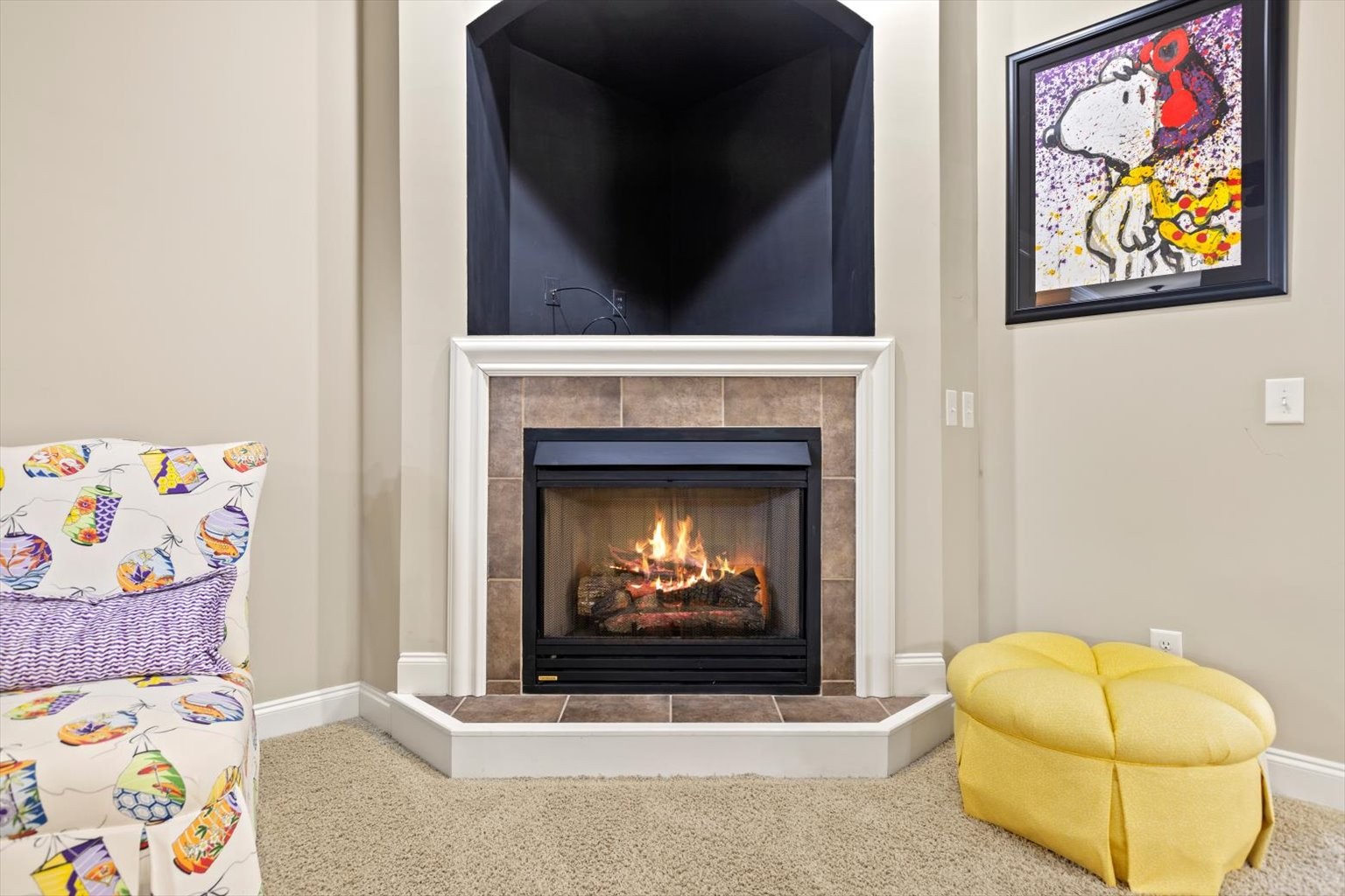 1114 Chickadee Circle Hermitage, TN 37076 - Photo 13 of 39 a living room with a fireplace and a painting on the wall