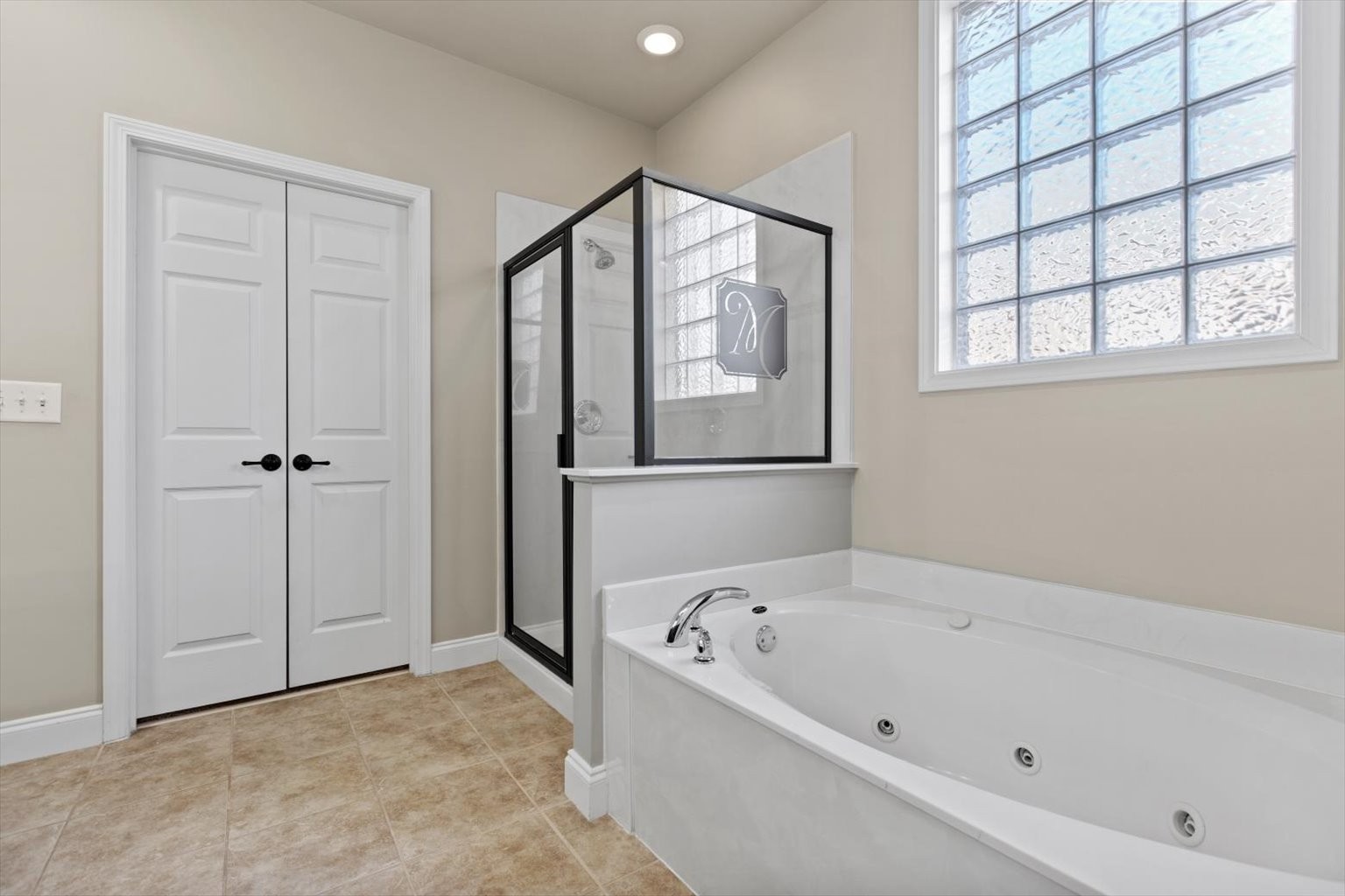 1114 Chickadee Circle Hermitage, TN 37076 - Photo 18 of 39 a bathroom with a bathtub and a shower