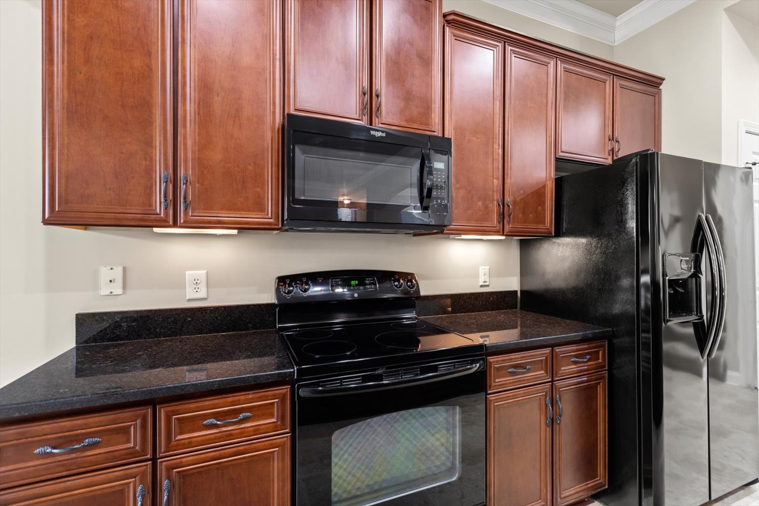 1114 Chickadee Circle Hermitage, TN 37076 - Photo 23 of 39 a kitchen with a refrigerator stove and cabinets