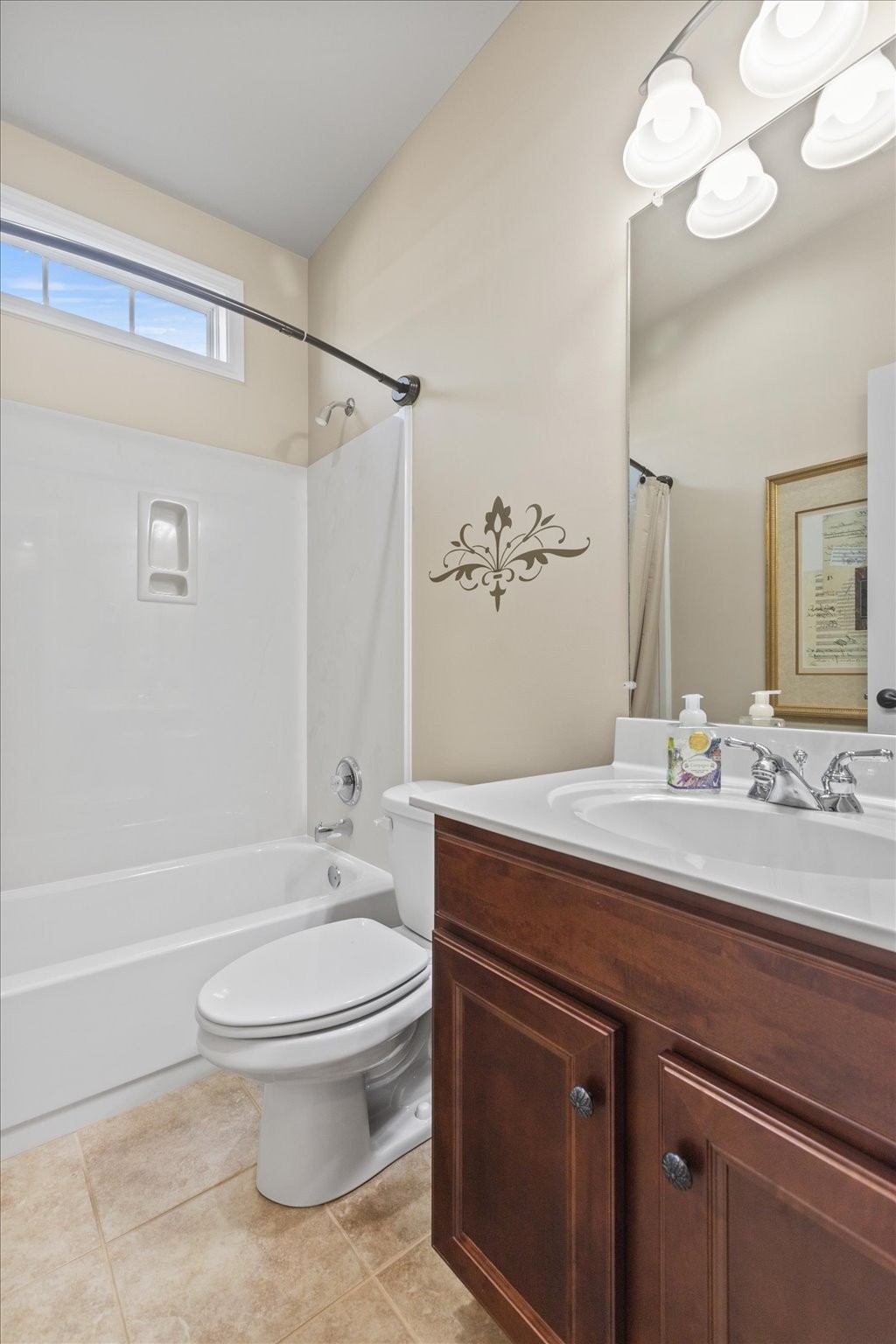 1114 Chickadee Circle Hermitage, TN 37076 - Photo 25 of 39 a bathroom with a sink a toilet and shower