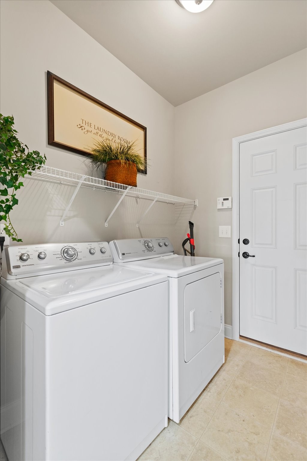 1114 Chickadee Circle Hermitage, TN 37076 - Photo 26 of 39 a utility room with dryer and washer