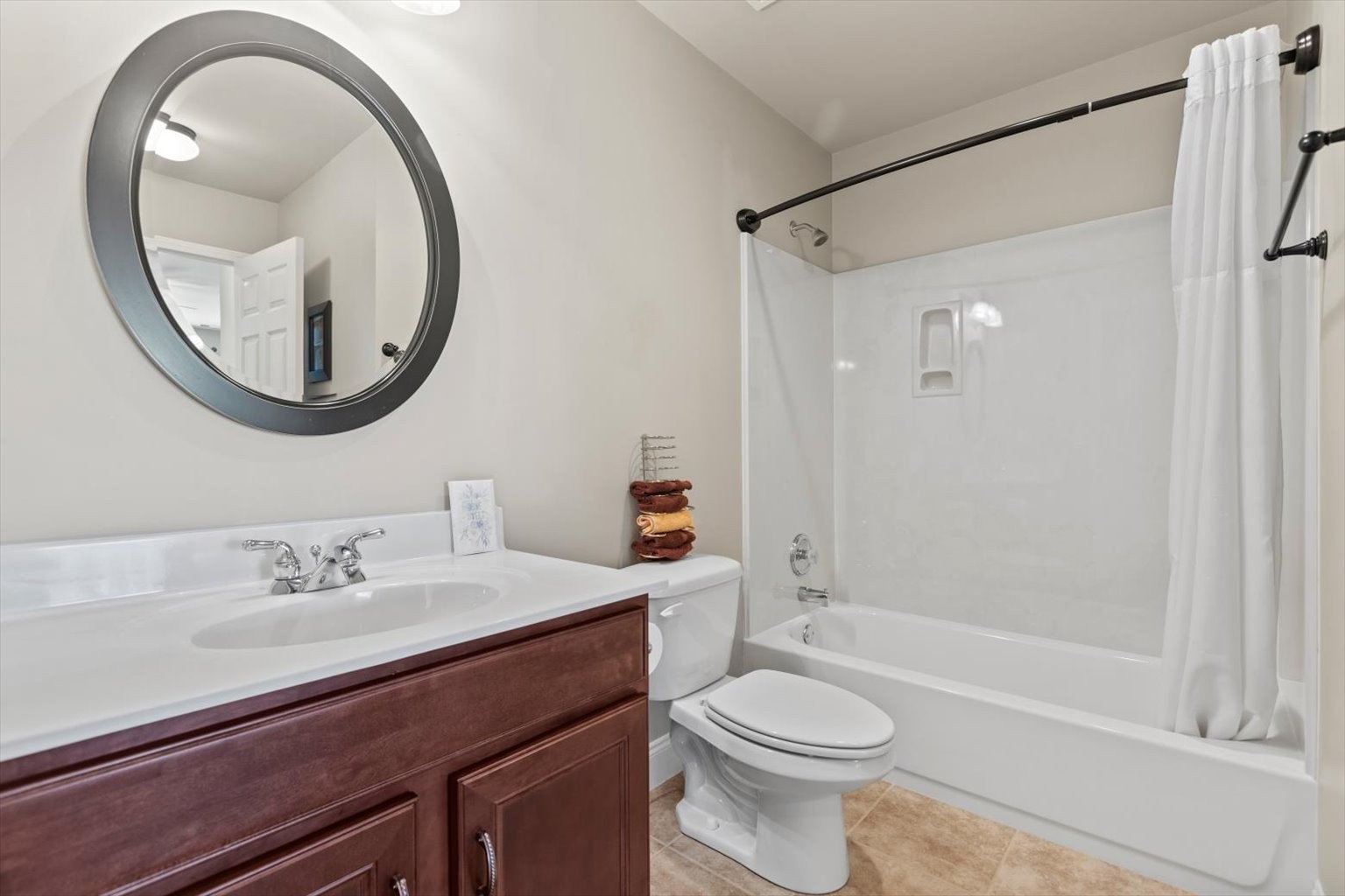 1114 Chickadee Circle Hermitage, TN 37076 - Photo 33 of 39 a bathroom with a sink a toilet and a mirror
