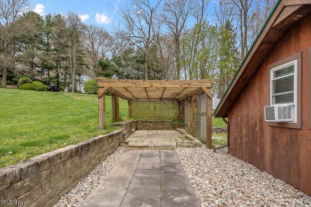 6939 Lakeview Road Hanoverton, OH 44423 - Photo 41 of 42 View of terrace featuring a pergola