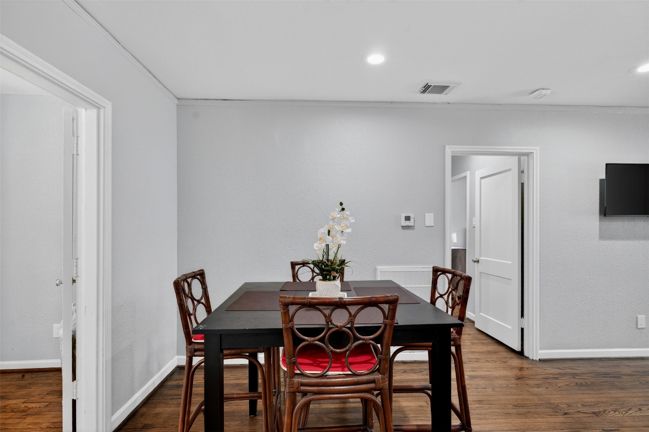 3863 Arbor Street Houston, TX 77004 - Photo 14 of 35 a dining room with furniture and wooden floor