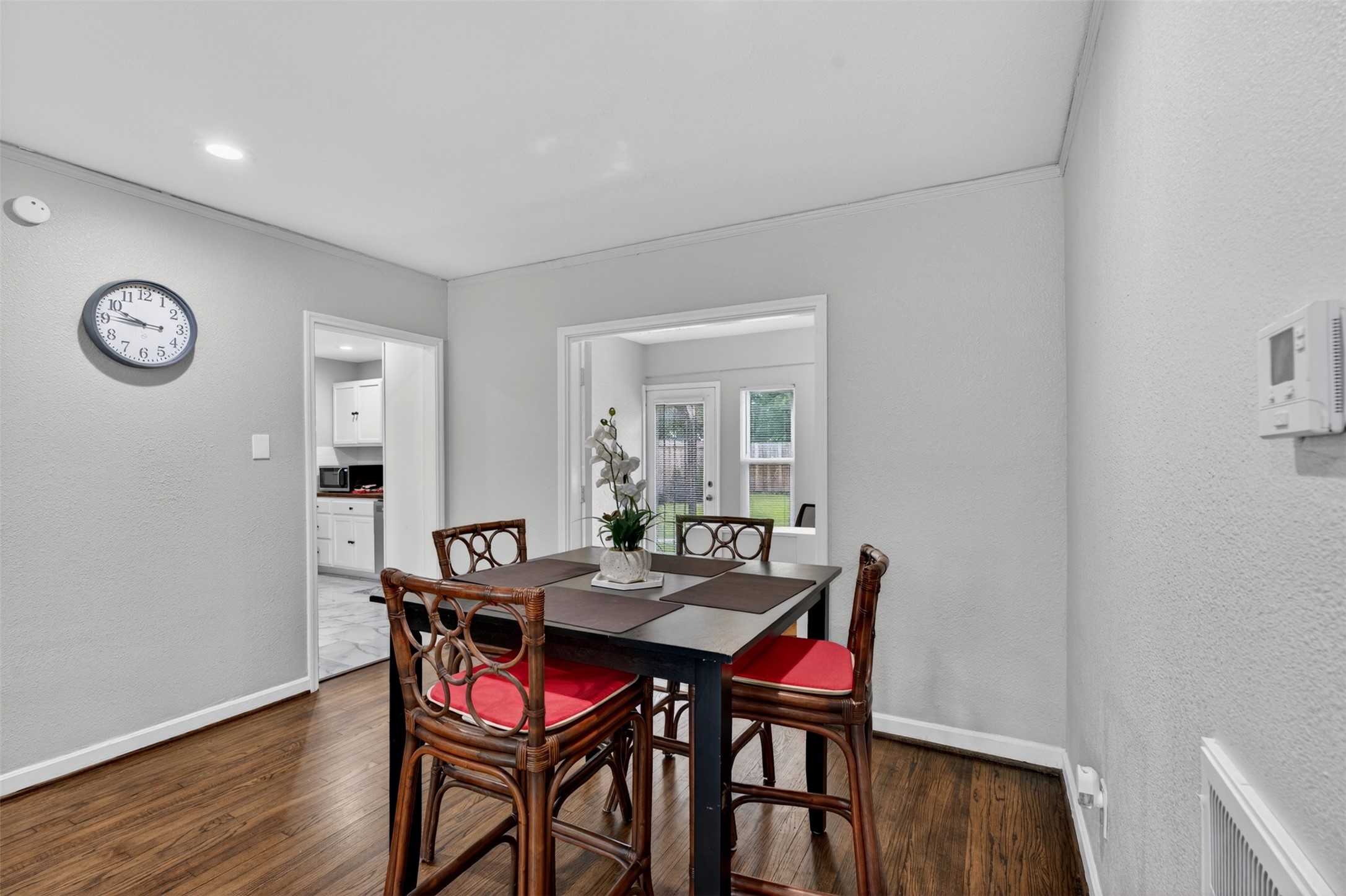 3863 Arbor Street Houston, TX 77004 - Photo 15 of 35 a view of a dining room with furniture and wooden floor