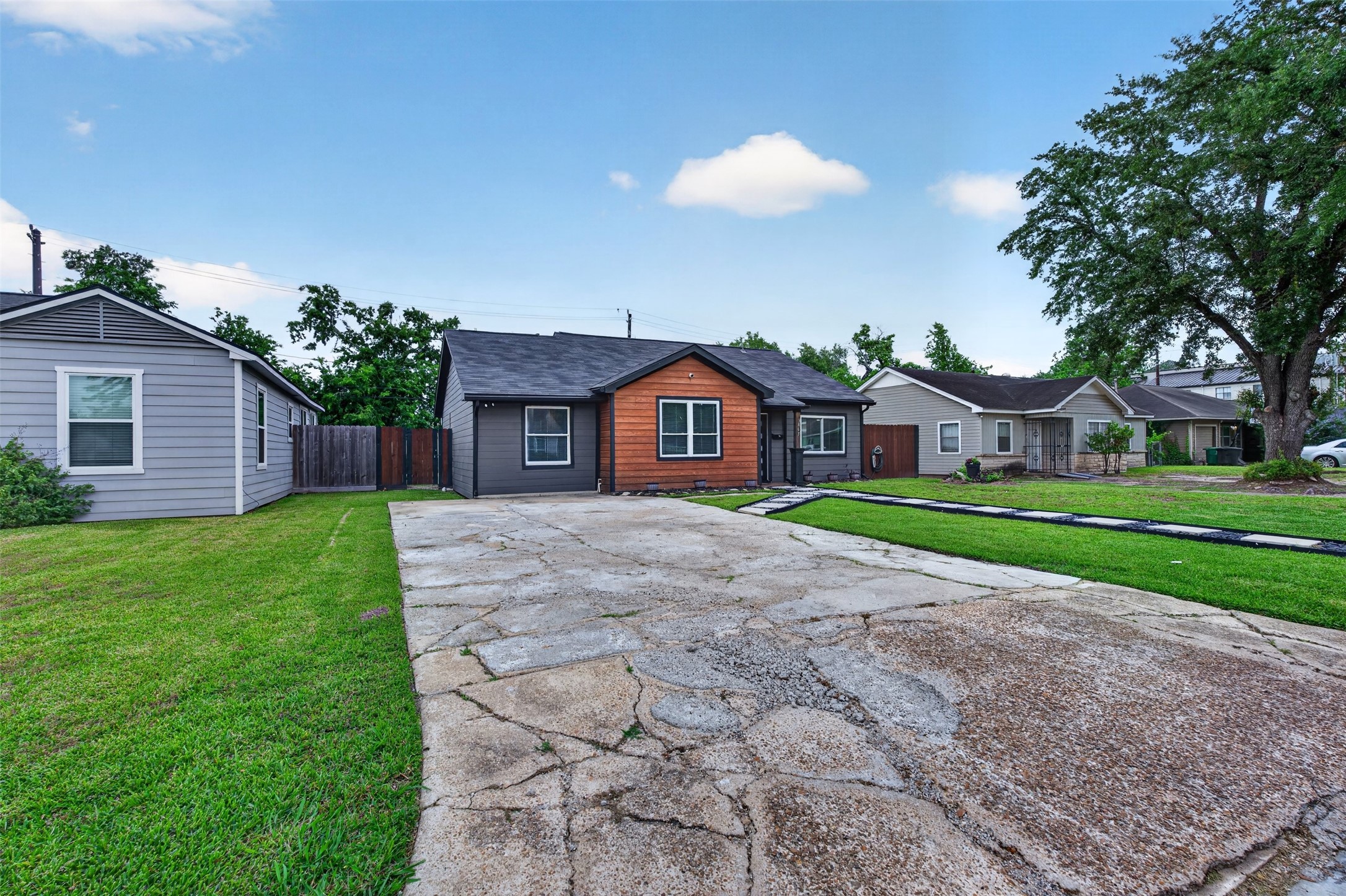 3863 Arbor Street Houston, TX 77004 - Photo 7 of 35 a house with green field in front of it
