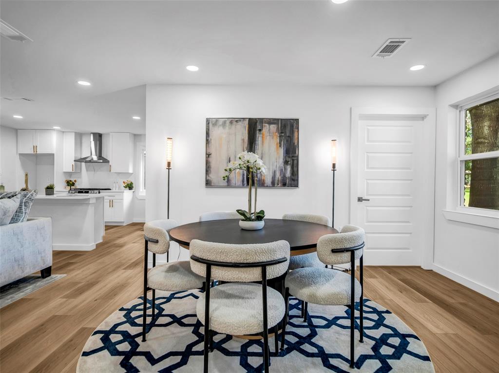 2371 Chart Drive Dallas, TX 75228 - Photo 5 of 31 a view of a dining room with furniture and wooden floor