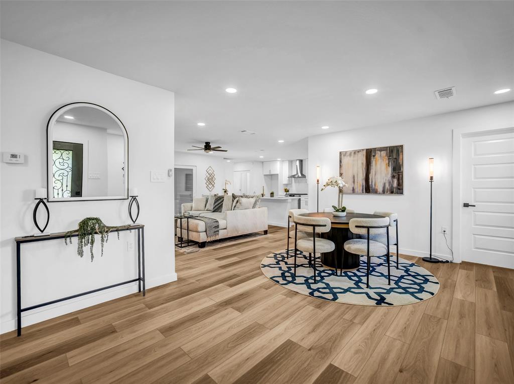 2371 Chart Drive Dallas, TX 75228 - Photo 7 of 31 a living room with furniture and a wooden floor