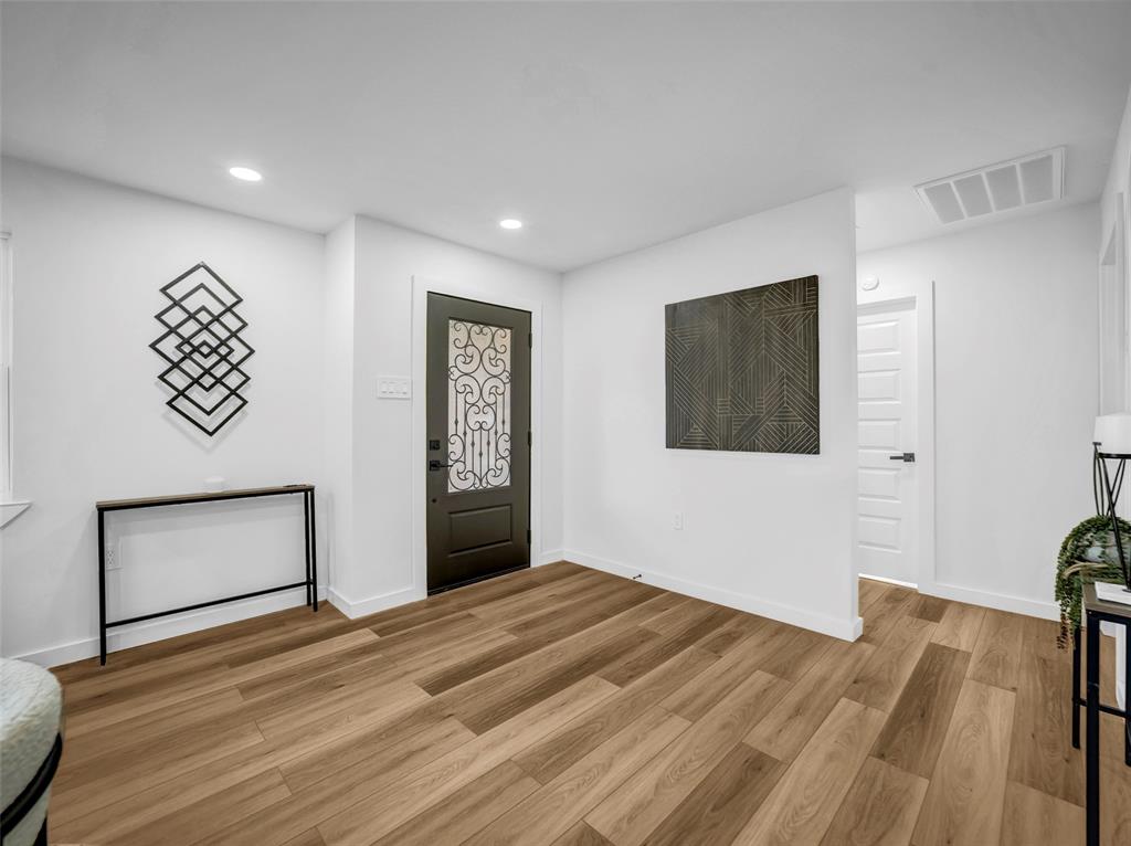 2371 Chart Drive Dallas, TX 75228 - Photo 8 of 31 a view of empty room with wooden floor