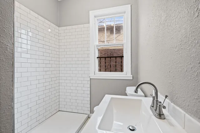 a bathroom with a sink and a bathtub