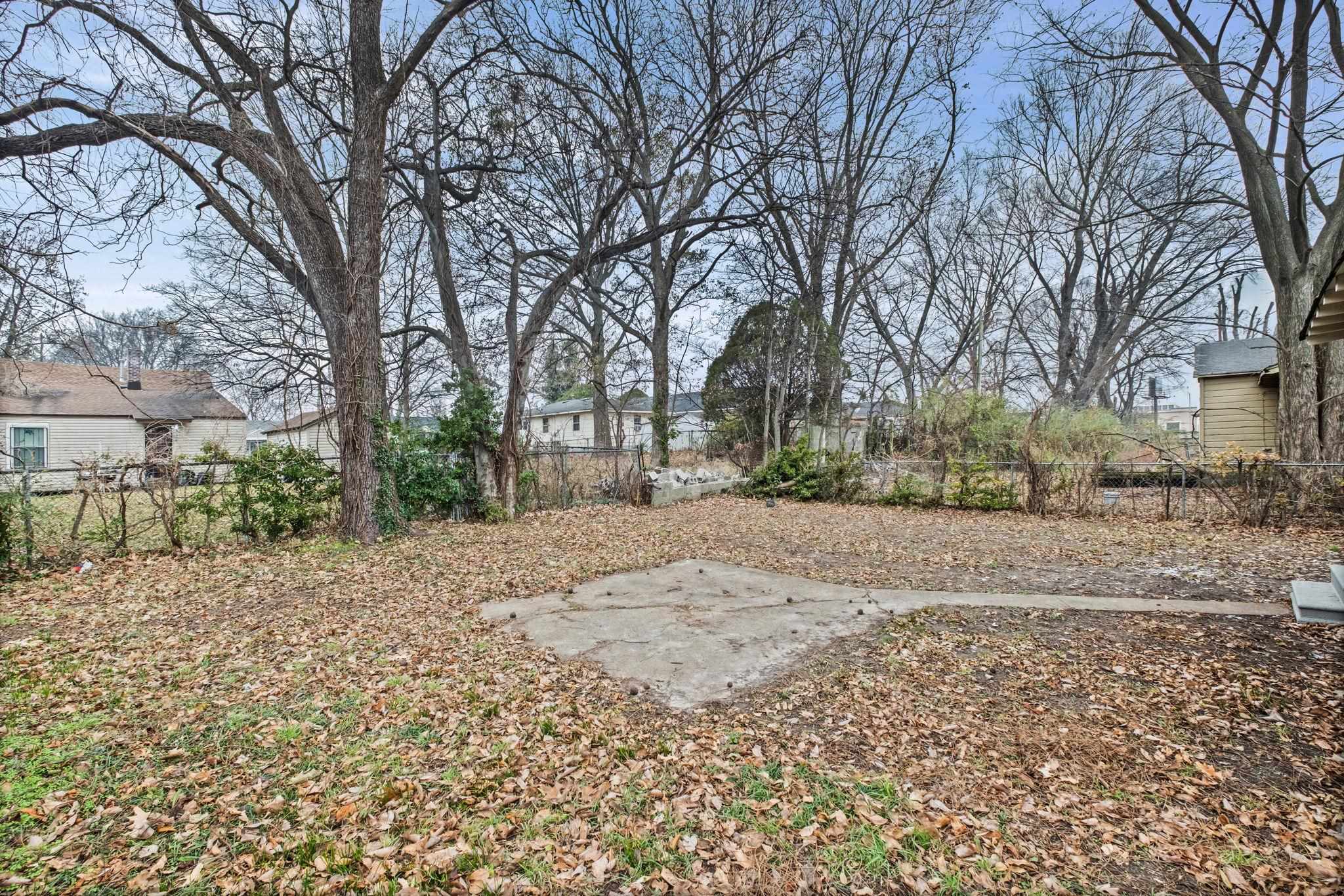 1503 Swift Street Memphis, TN 38109 - Photo 4 of 17 a view of road and trees