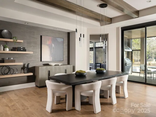 a front view of a house with a garden and plants