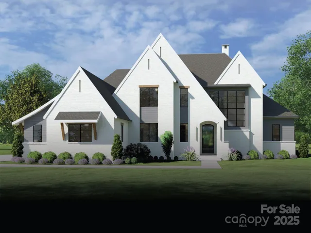 a living room with couches a flat tv screen and a dining table with garden view