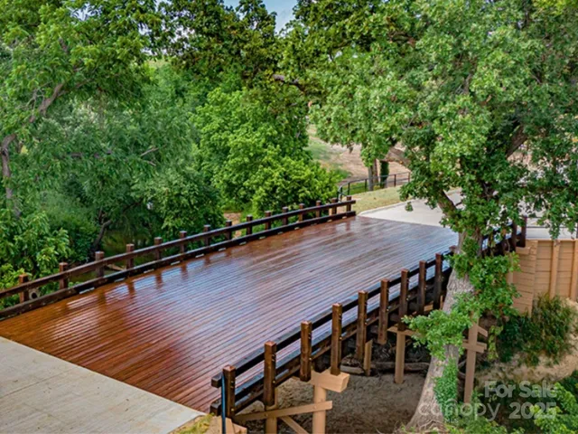 a front view of a building with sitting area
