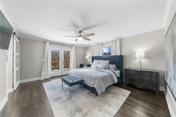 a view of a storage and utility room with a washer dryer