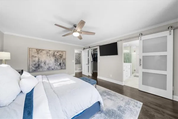a view of backyard with wooden floor and fence and a ceiling fan