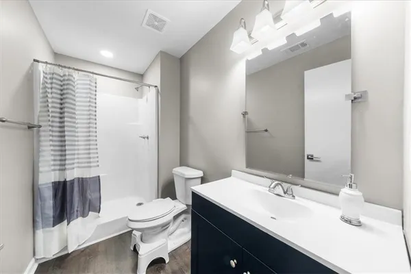 a view of a car parked in front of building