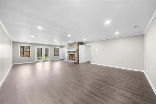 a view of a chairs and table in the patio