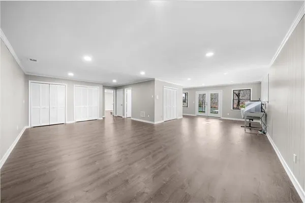 a view of a lake in middle of forest