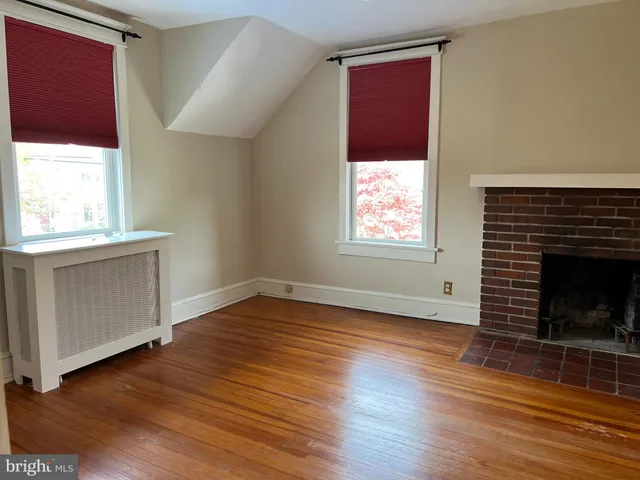 a backyard of a house with outdoor seating