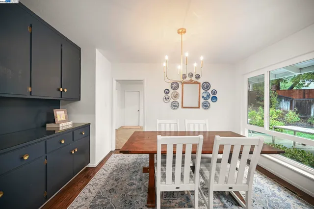 a view of a dining room and furniture