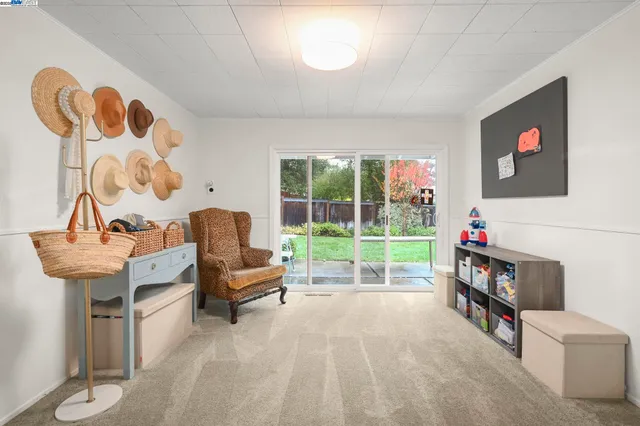a view of a house with a yard porch and sitting area