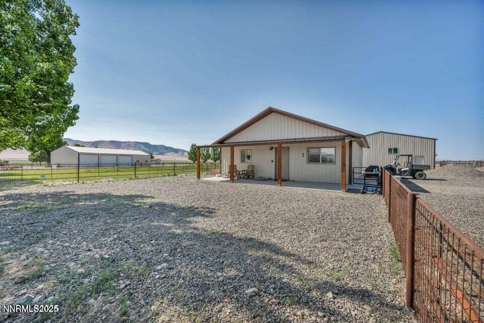 2505 Baines Road Winnemucca, NV 89445 - Photo 14 of 45 a view of a house with garden and patio