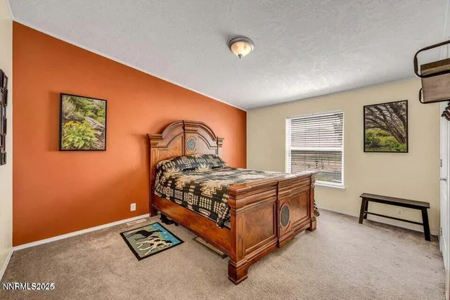 a view of a livingroom with furniture window and outside view