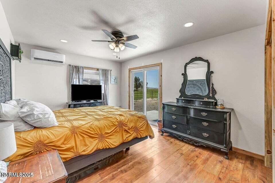 2505 Baines Road Winnemucca, NV 89445 - Photo 30 of 45 a bedroom with a bed and a television