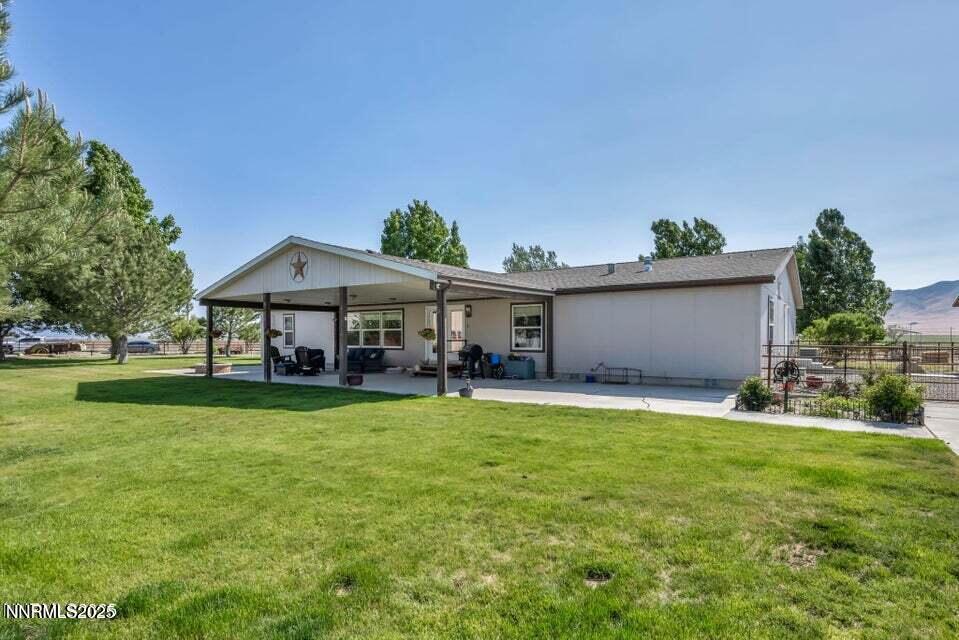 2505 Baines Road Winnemucca, NV 89445 - Photo 6 of 45 a view of a house with a yard and sitting area