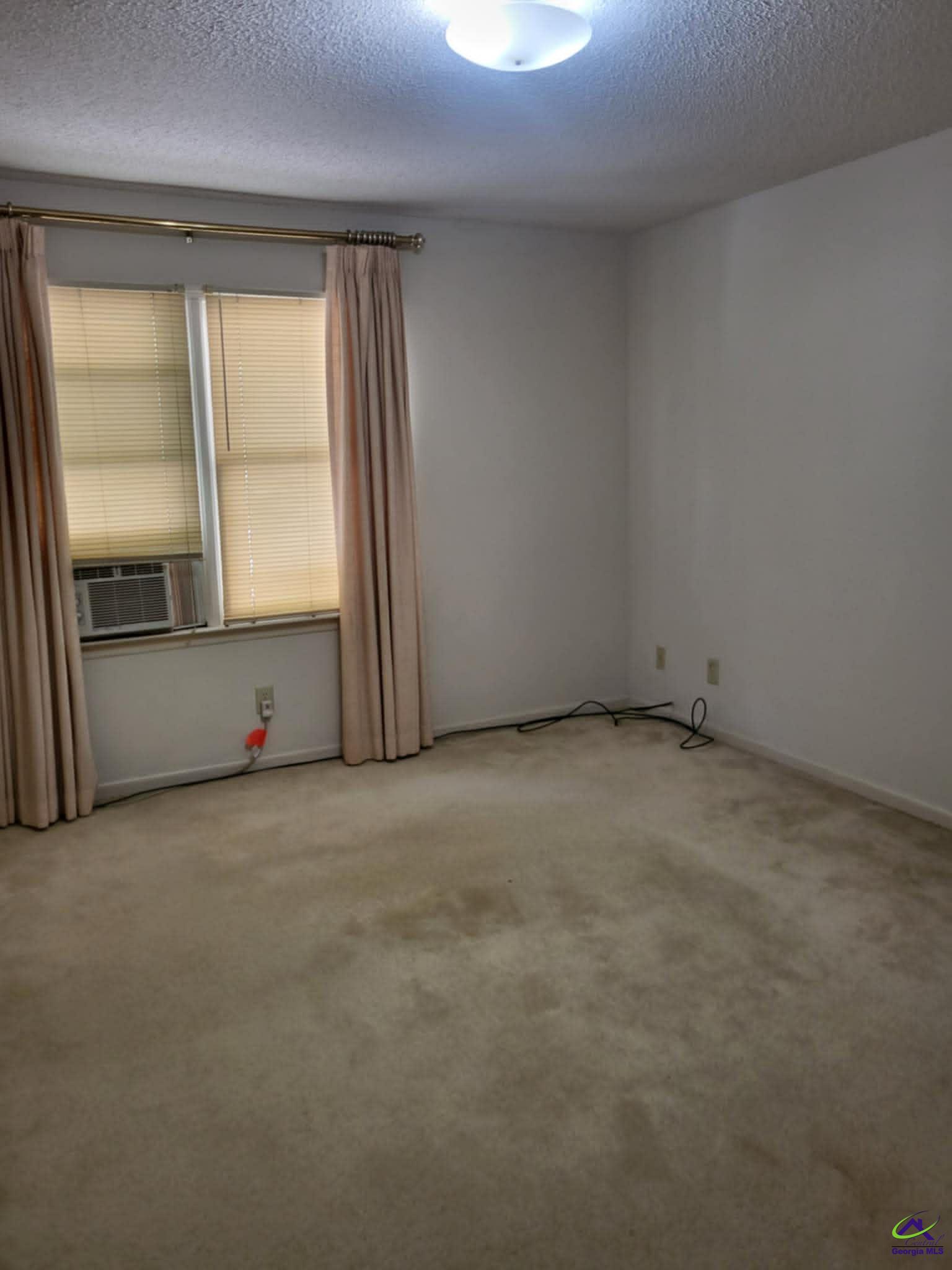 4472 Club Trace Macon, GA 31210 - Photo 7 of 10 an empty room with a window
