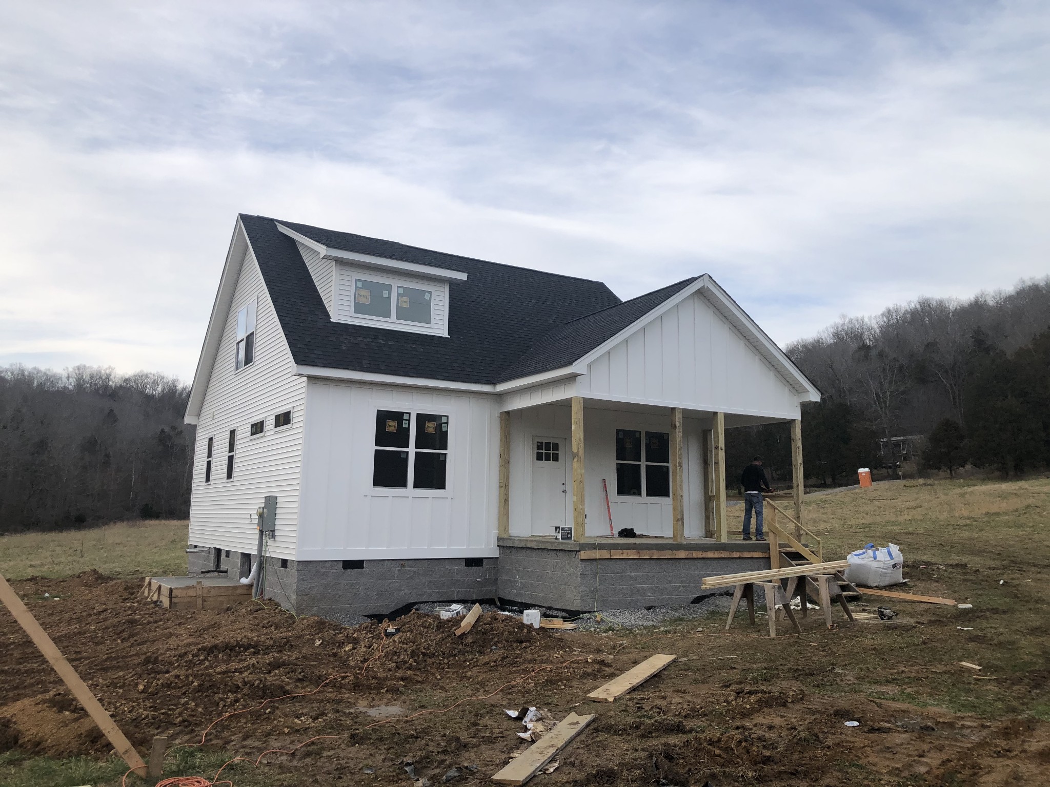 1129 Duffer Hollow Road Bethpage, TN 37022 - Photo 1 of 2 a backyard of a house with table and chairs