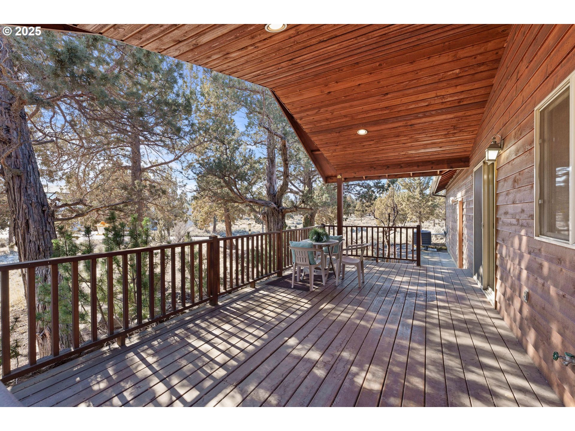 64520 Joe Neil Road Bend, OR 97701 - Photo 12 of 40 a view of balcony with wooden floor
