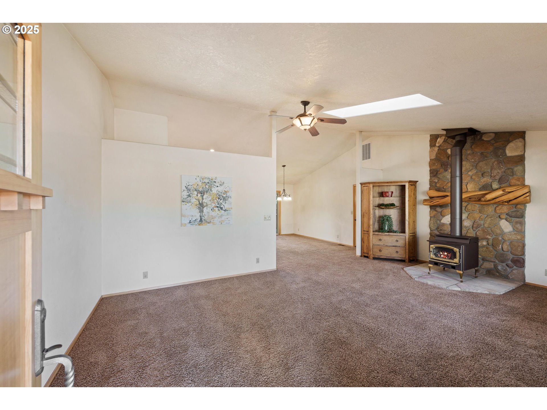 64520 Joe Neil Road Bend, OR 97701 - Photo 14 of 40 a view of a livingroom with a fireplace