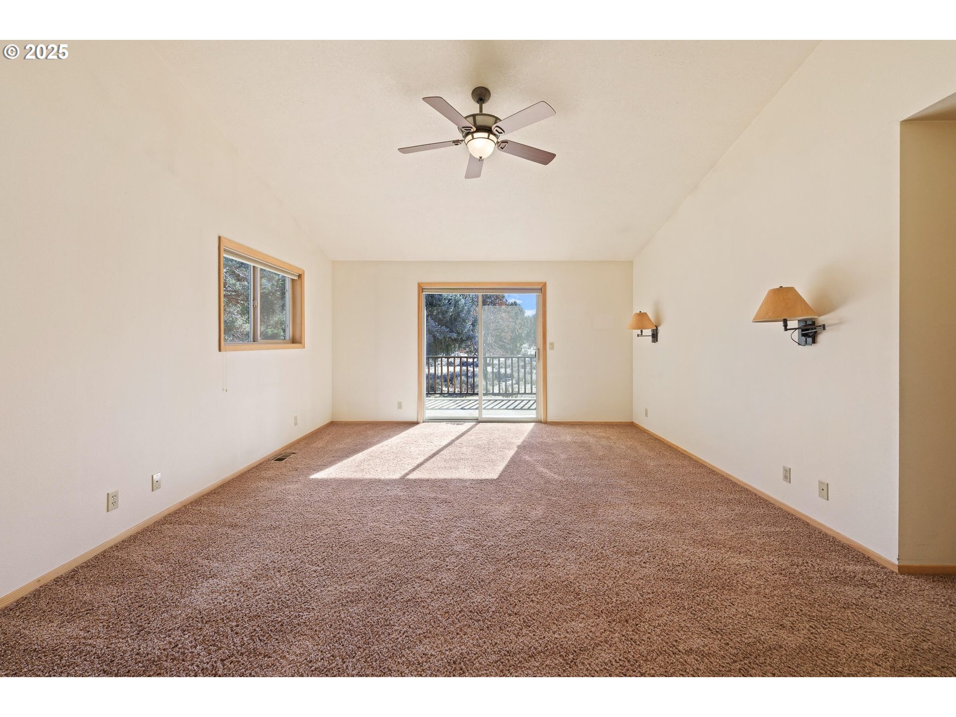 64520 Joe Neil Road Bend, OR 97701 - Photo 23 of 40 a view of an empty room with a window