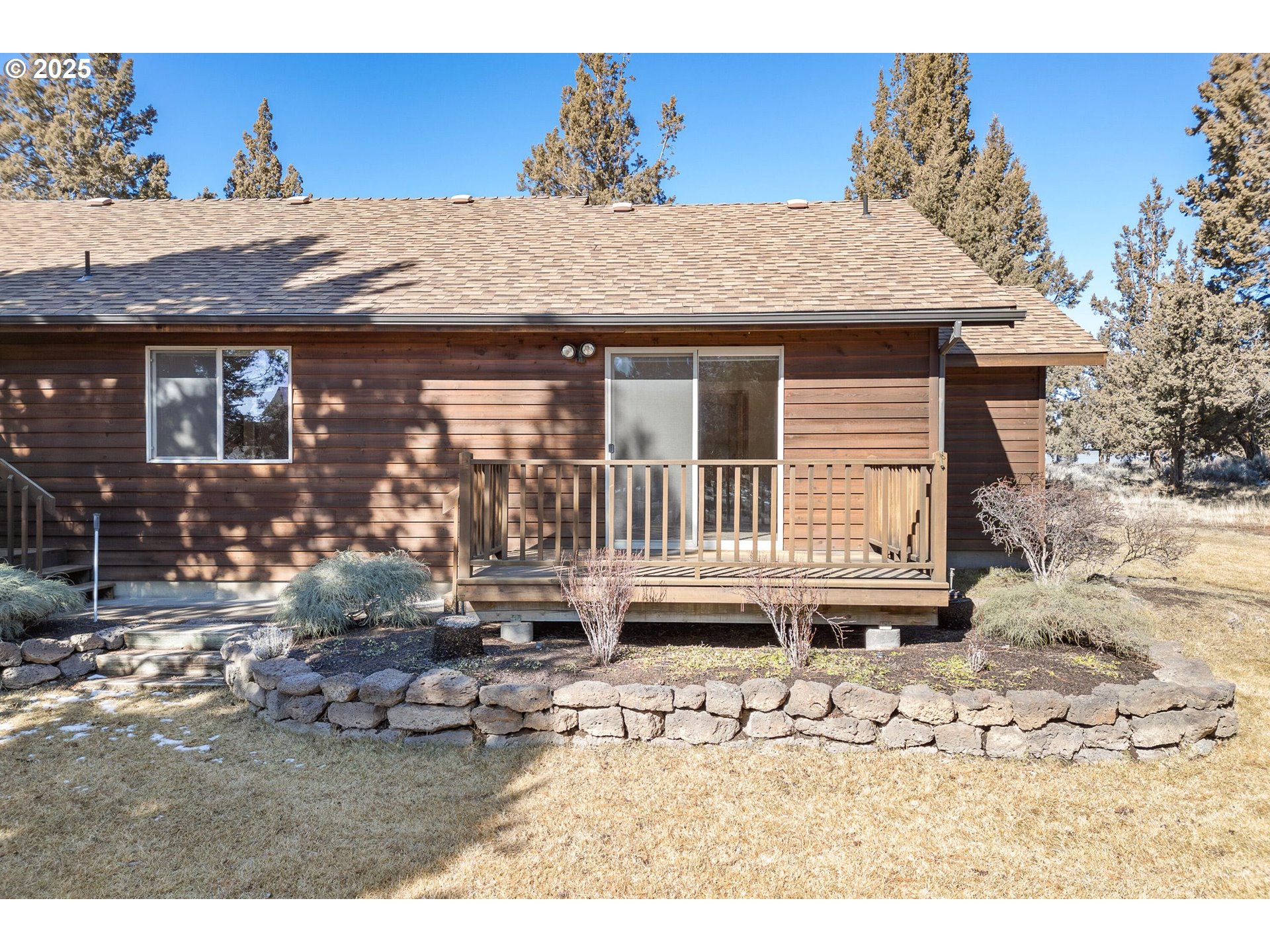 64520 Joe Neil Road Bend, OR 97701 - Photo 8 of 40 a view of a house with a outdoor space
