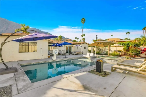 a view of a terrace with sitting area