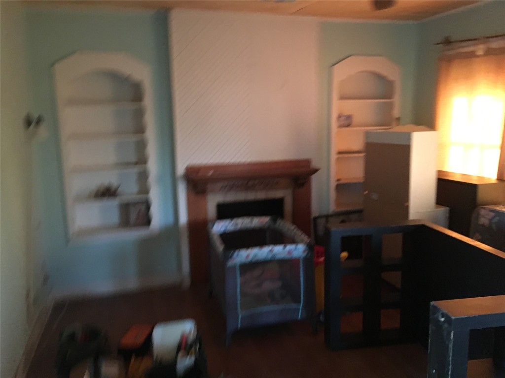 Undisclosed Address Niederwald, TX 78640 - Photo 3 of 10 a kitchen with a refrigerator and a stove