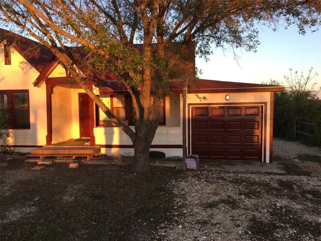 Undisclosed Address Niederwald, TX 78640 - Photo 10 of 10 a view of house with backyard and tree