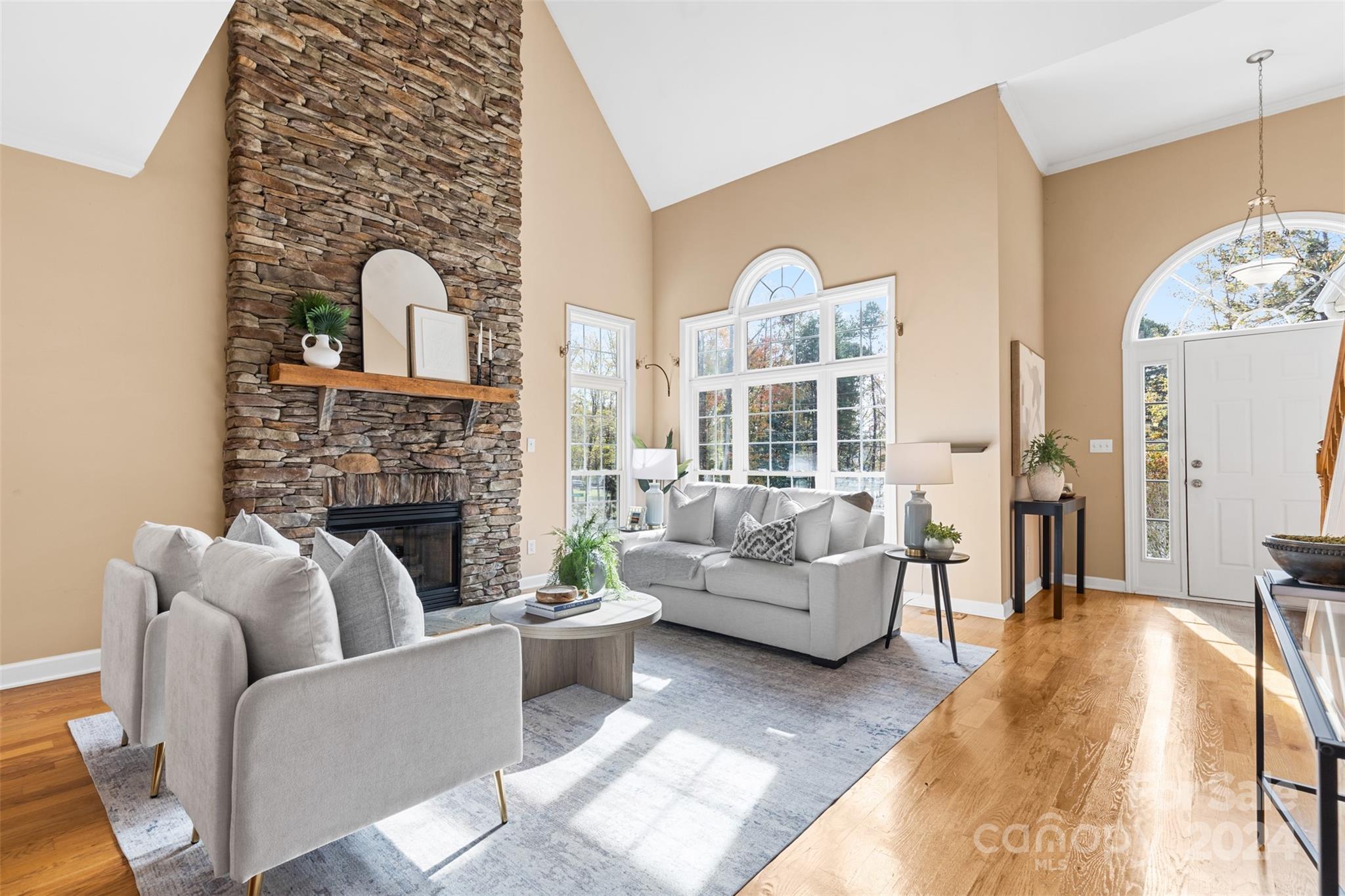 7189 Windy Pine Circle Denver, NC 28037 - Photo 11 of 34 a living room with furniture and a fireplace