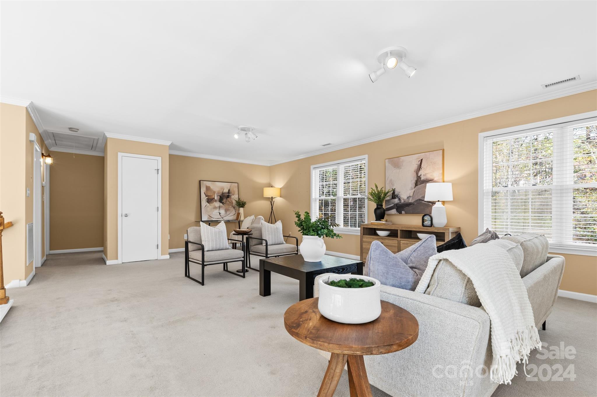 7189 Windy Pine Circle Denver, NC 28037 - Photo 21 of 34 a living room with furniture and a large window