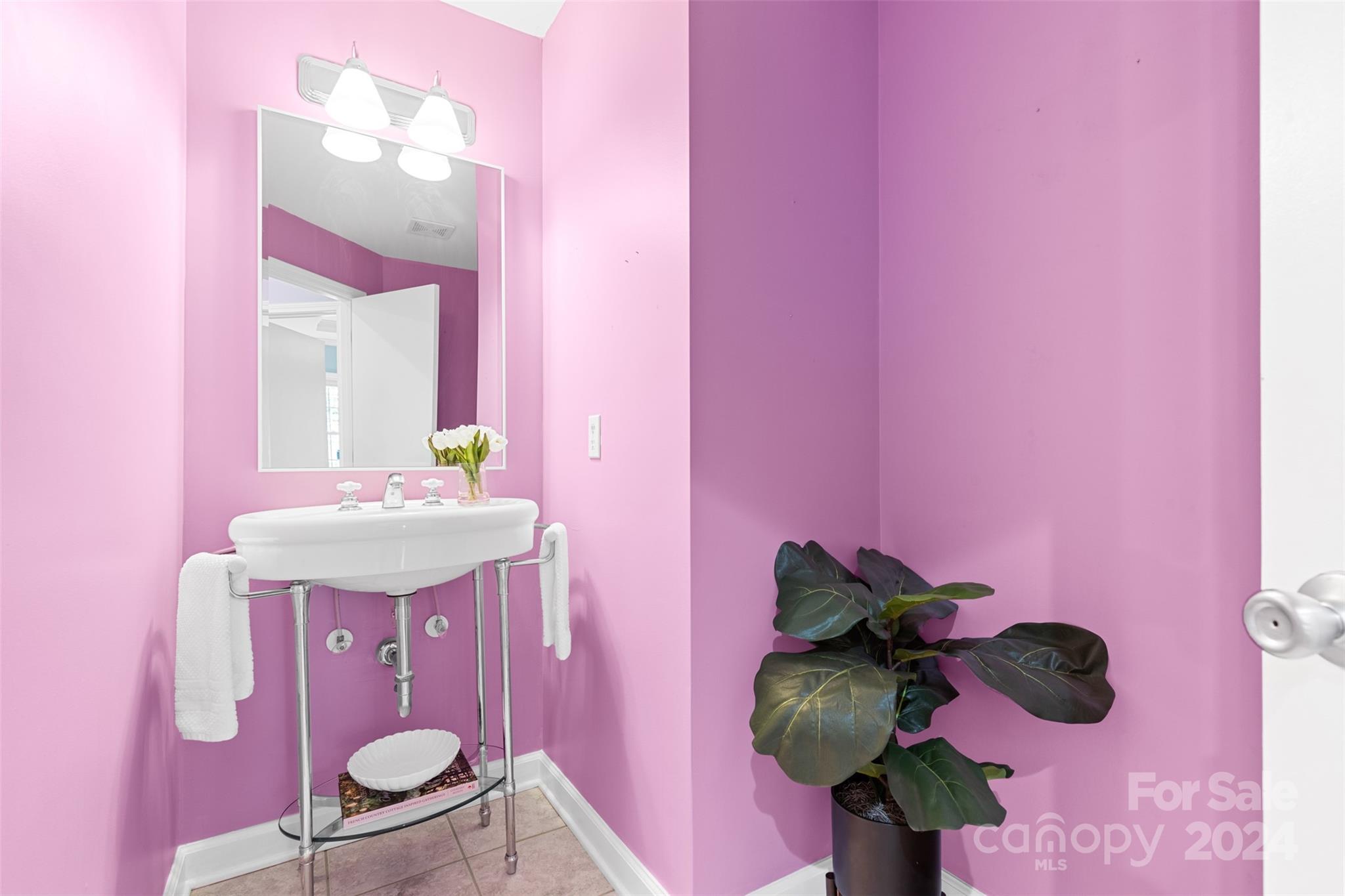 7189 Windy Pine Circle Denver, NC 28037 - Photo 27 of 34 a bathroom with a sink mirror and vanity
