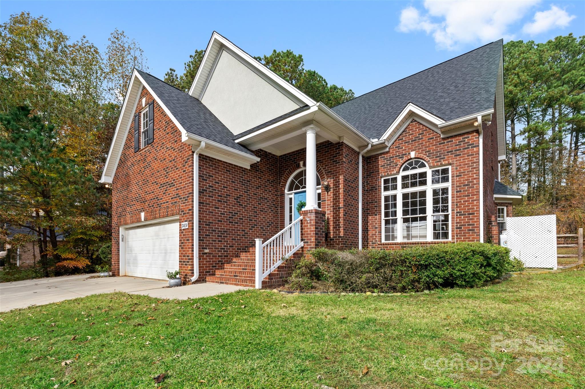 7189 Windy Pine Circle Denver, NC 28037 - Photo 34 of 34 a view of a house with a yard and plants