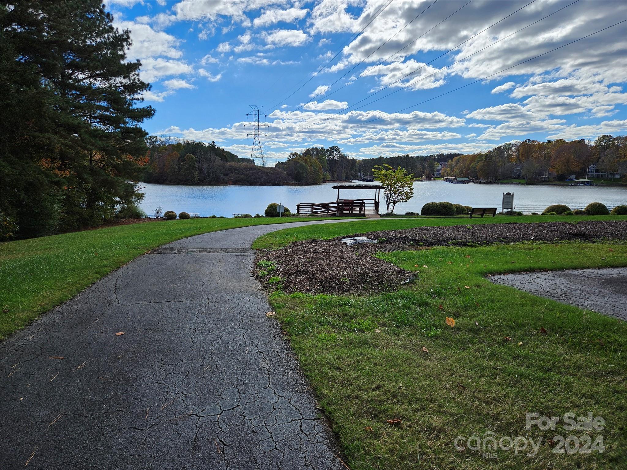 7189 Windy Pine Circle Denver, NC 28037 - Photo 4 of 34 a view of a garden with houses