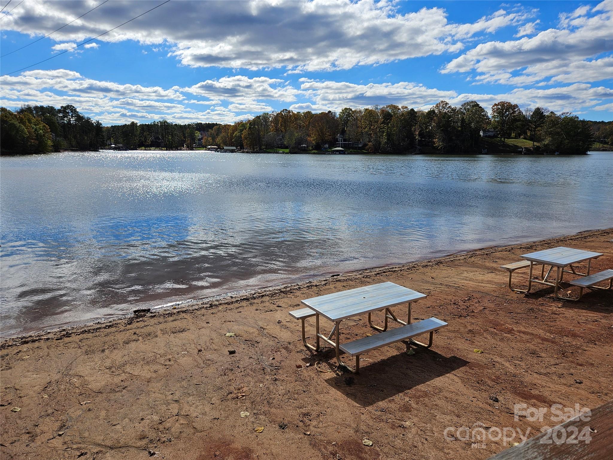 7189 Windy Pine Circle Denver, NC 28037 - Photo 5 of 34 a view of a lake with a mountain