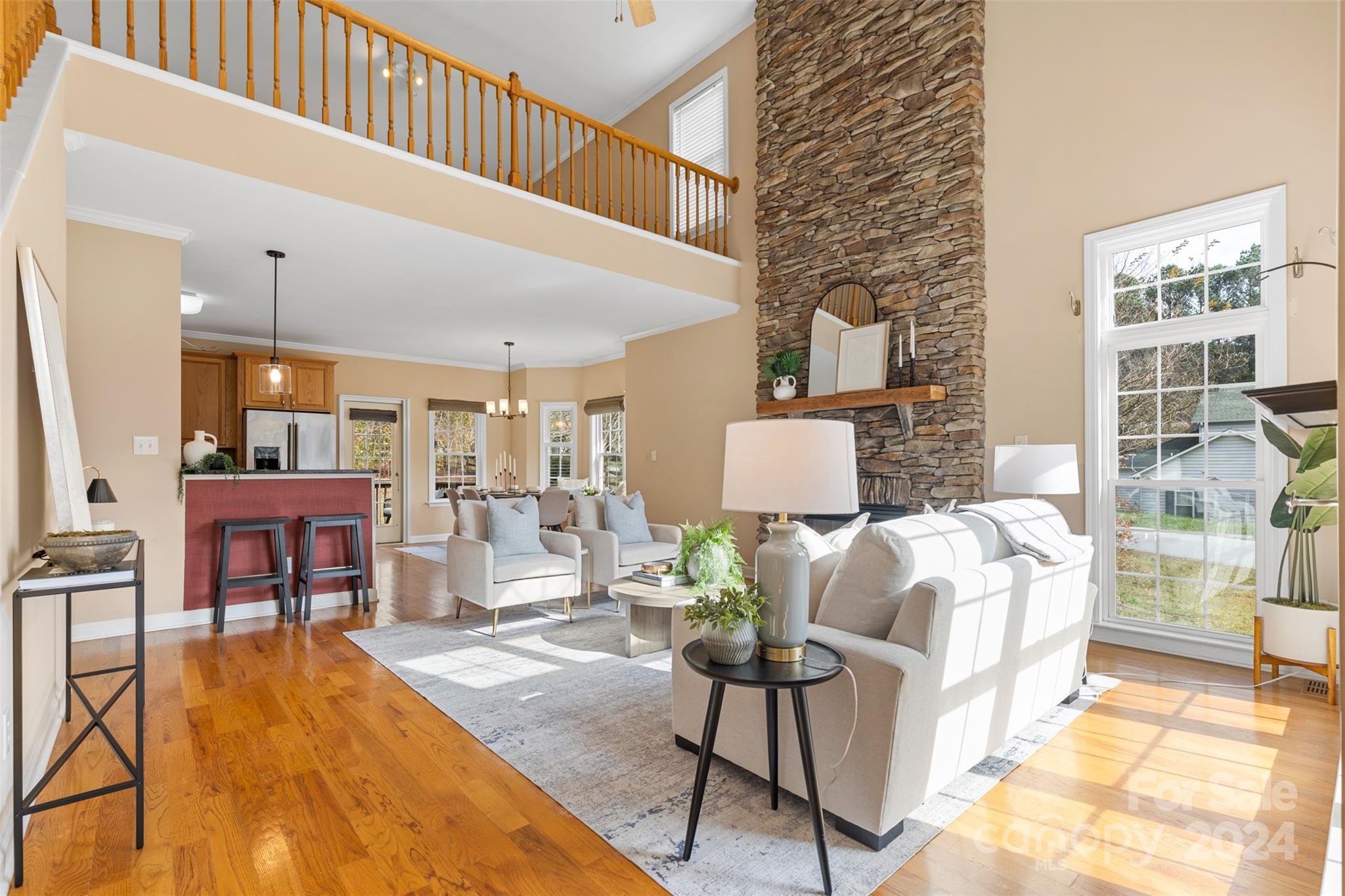 7189 Windy Pine Circle Denver, NC 28037 - Photo 10 of 34 a living room with furniture and a rug