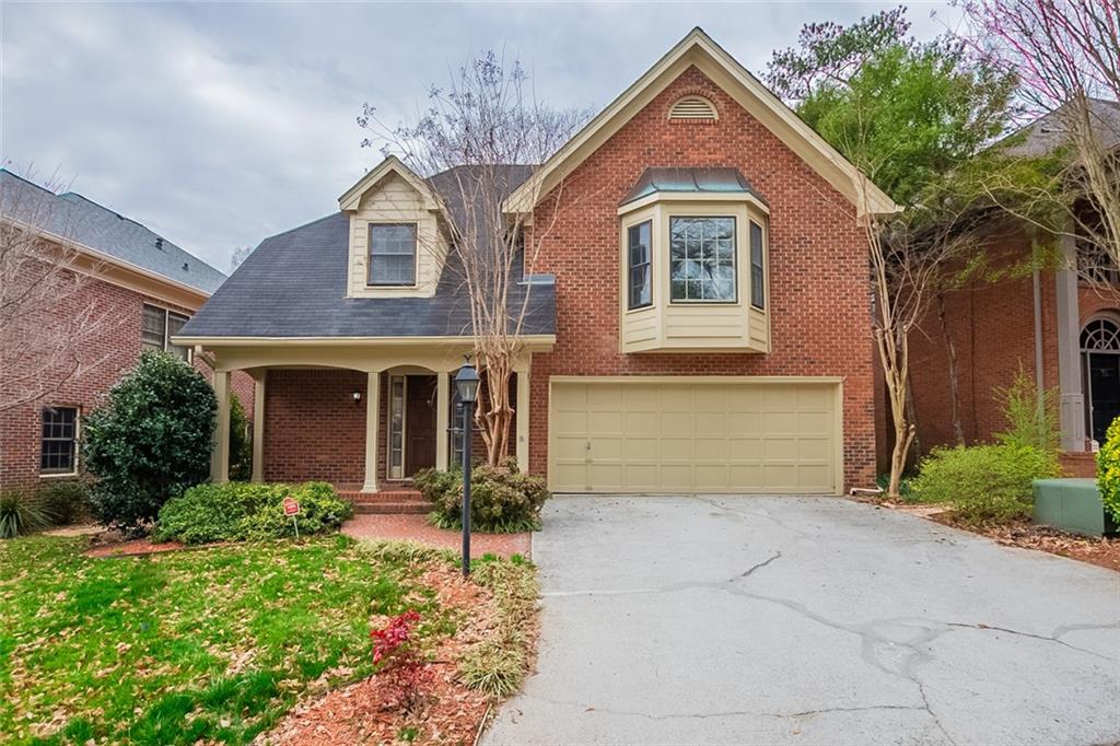 1732 Wilsons Crossing Drive Decatur, GA 30033 - Photo 1 of 1 a front view of a house with garden