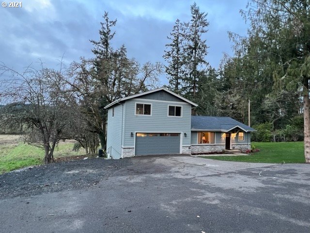 83490 Rattlesnake Road Dexter, OR 97431 - Photo 2 of 27 a view of house with outdoor space and trees
